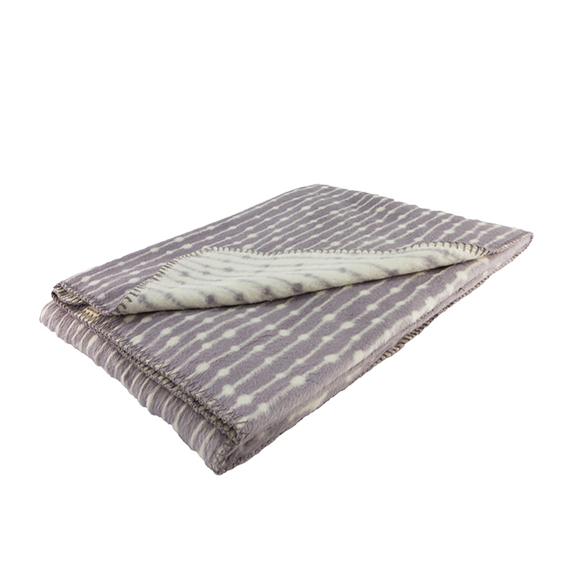 grey throw blanket in organic cotton with simple graphical scandinavian design dew drops