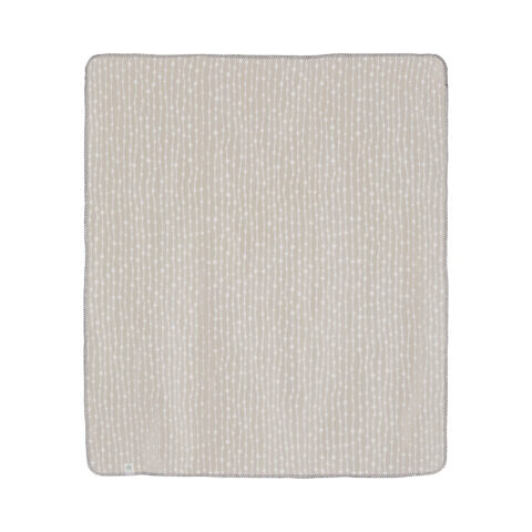 DEW blanket in soft beige. A calming color that elevates the comfort and coziness of the blanket itself